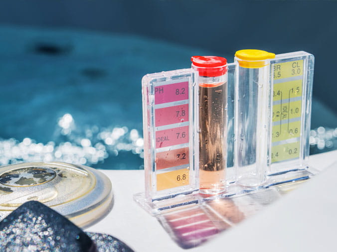 Closup of pool water chemistry testing kit